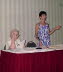 Vi Dace and Paula Ponas conducting the 1998 meeting